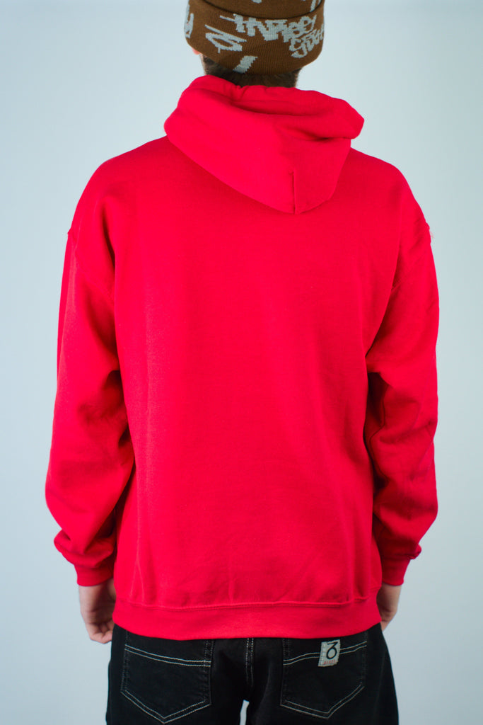 Bright red hooded sweatshirt worn by a person viewed from behind.