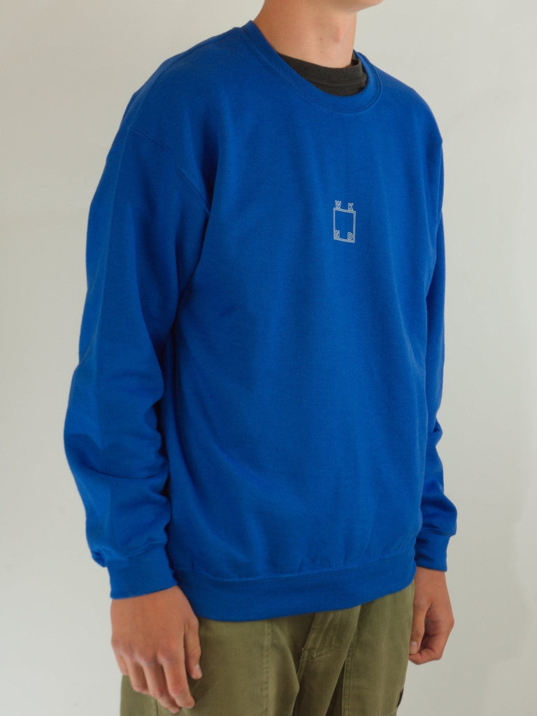 Bright blue crewneck sweatshirt with a small logo on the chest.
