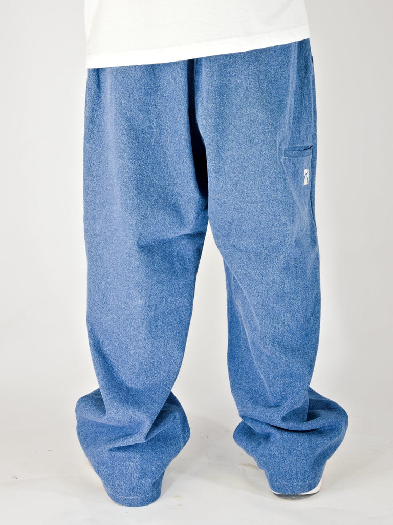 Pair of oversized, baggy blue jeans.